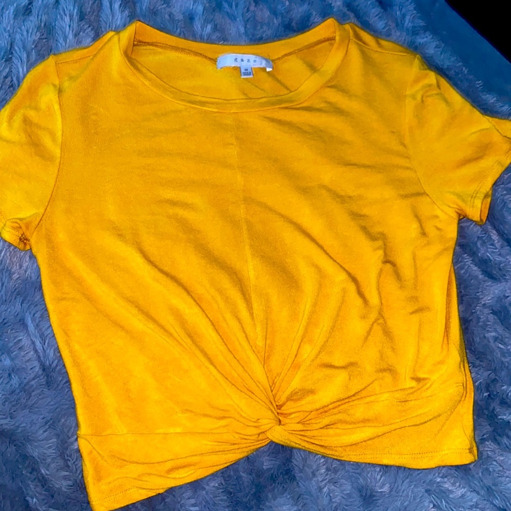 Bright yellow cropped shirt
